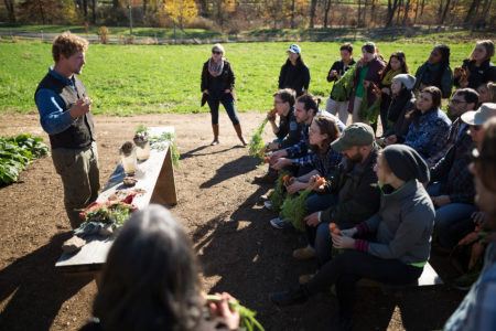 Davis Lindsey leading farmer workshop in vegetable field