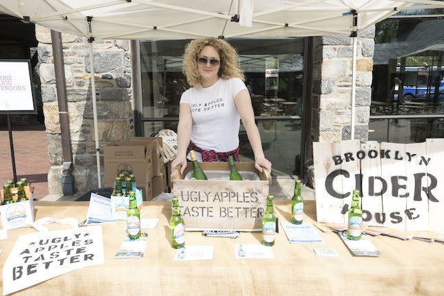 Lindsey Storm of Brooklyn Cider House serving fresh cider at 2017 Sheep Shearing Fest
