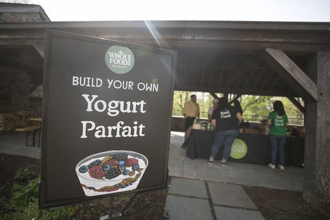 Whole Foods Build Your Own Yogurt Parfait. Whole Foods workers teaching cooking to guests in courtyard at 2017 Sheep Shearing Fest